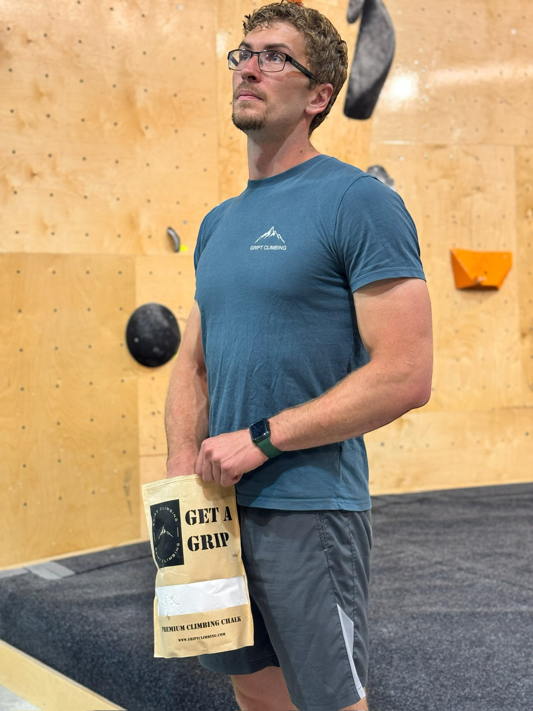 Man holding bag of chalk