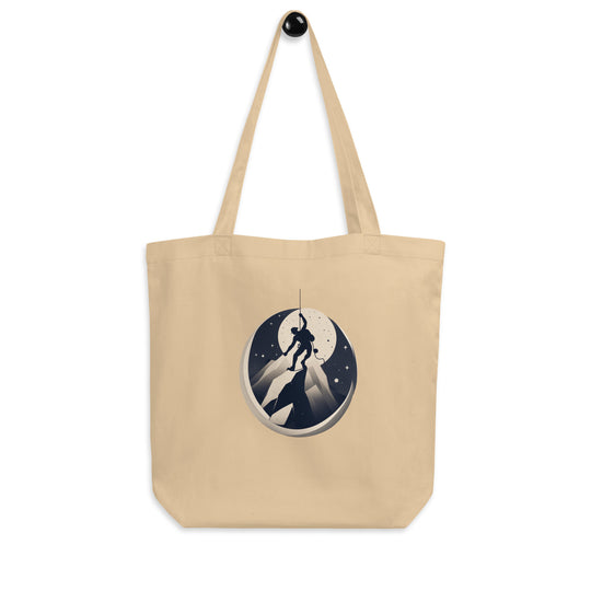 Oyster coloured tote bag picturing a climber getting to the top a of mountain