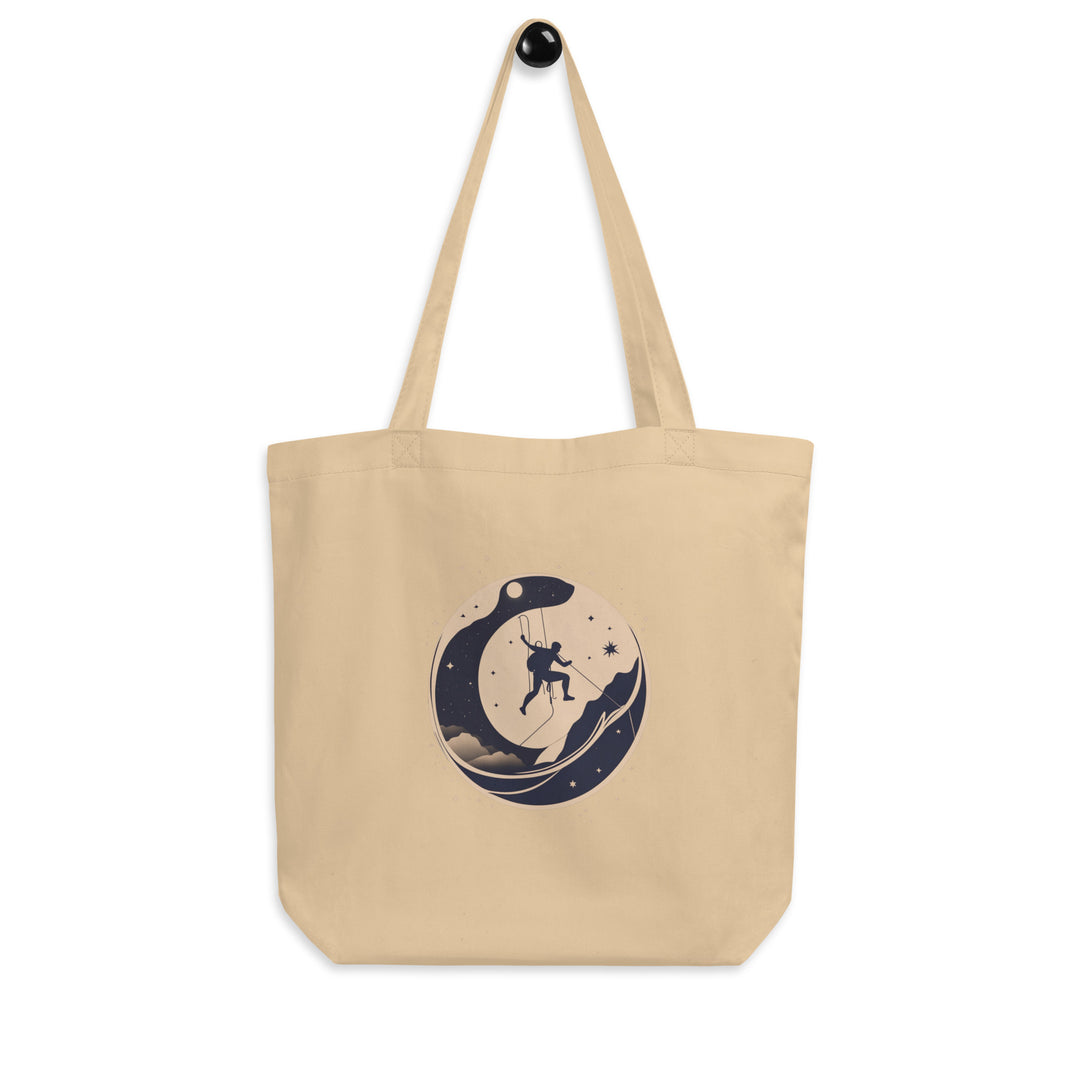 Oyster coloured tote bag picturing a climber traversing a wall