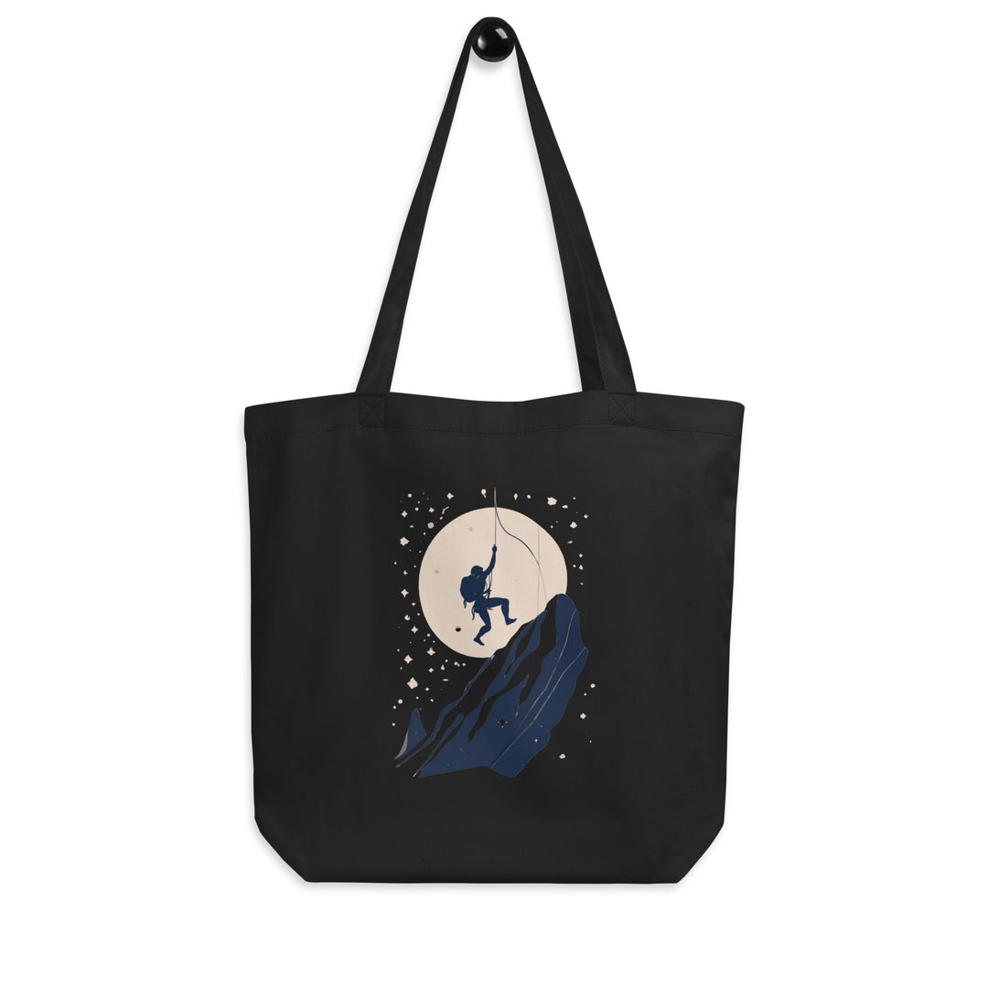 Black tote bag picturing a climber taking a whip/fall