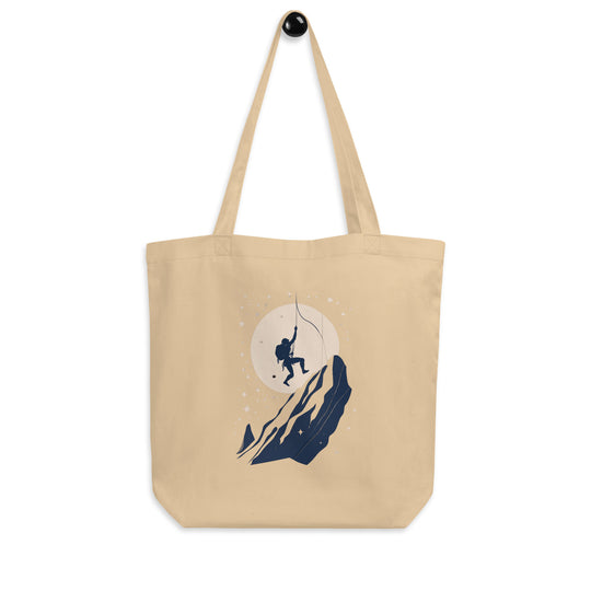 Oyster coloured tote bag picturing a climber taking a whip/fall