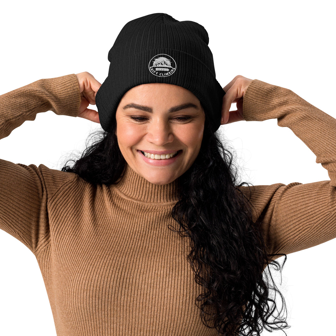 Woman in black beanie