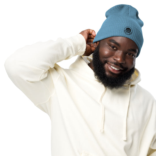 Man with blue beanie